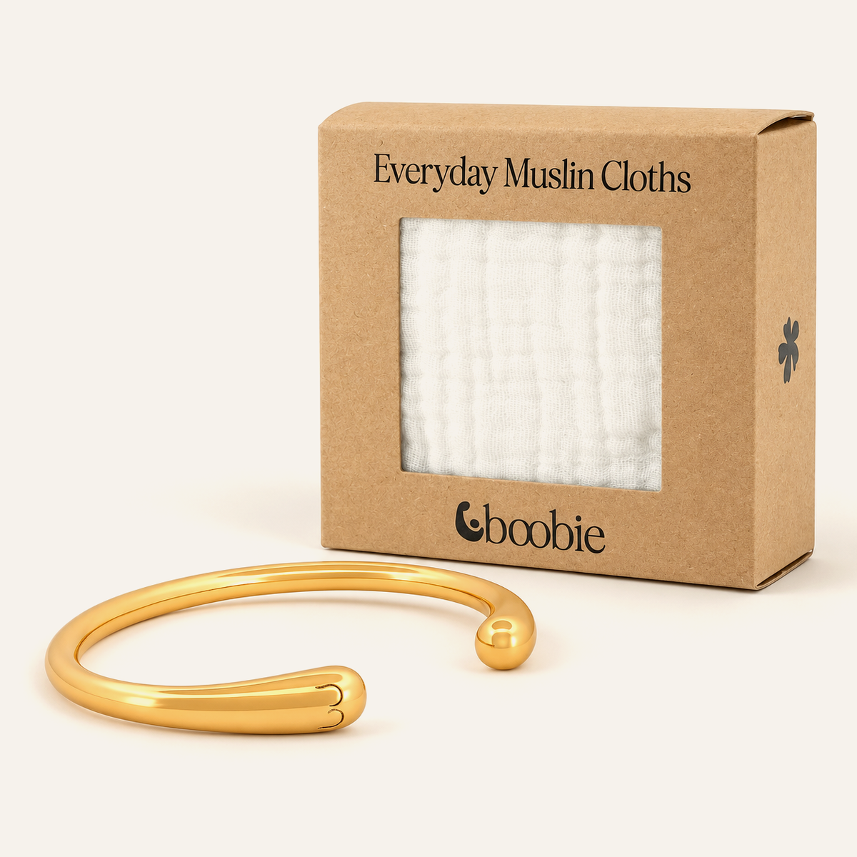 Everyday Feeding Set with one gold Signature Boobie Bracelet and one five-pack of reusable muslin baby wipes.
